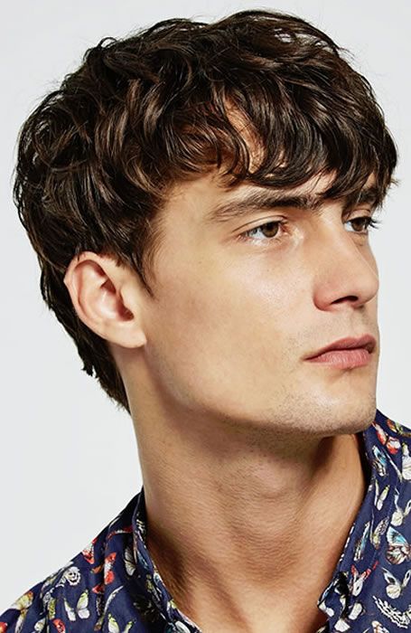Model with lengthy fringes looking to his right