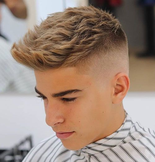 teen with a mid fade haircut