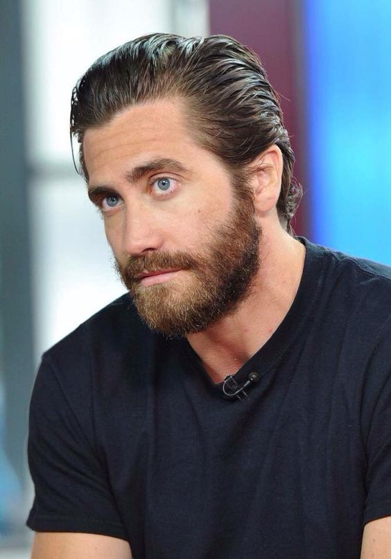 Jake Gyllenhaal with slicked back haircut. 