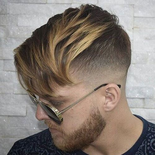 Man with undercut haircut and sunglasses.