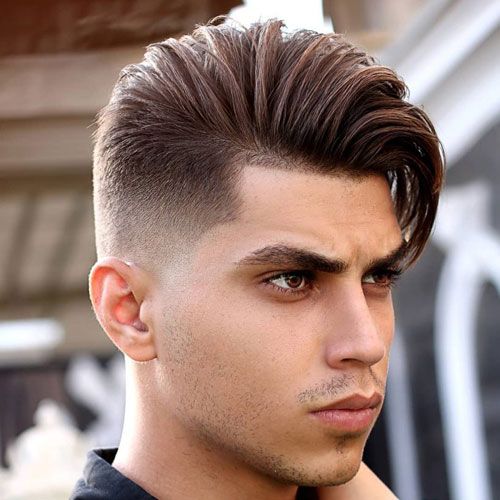 Man looking to right with side swept haircut