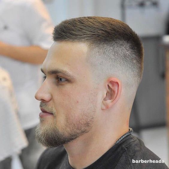 Man with a crew cut fade haircut